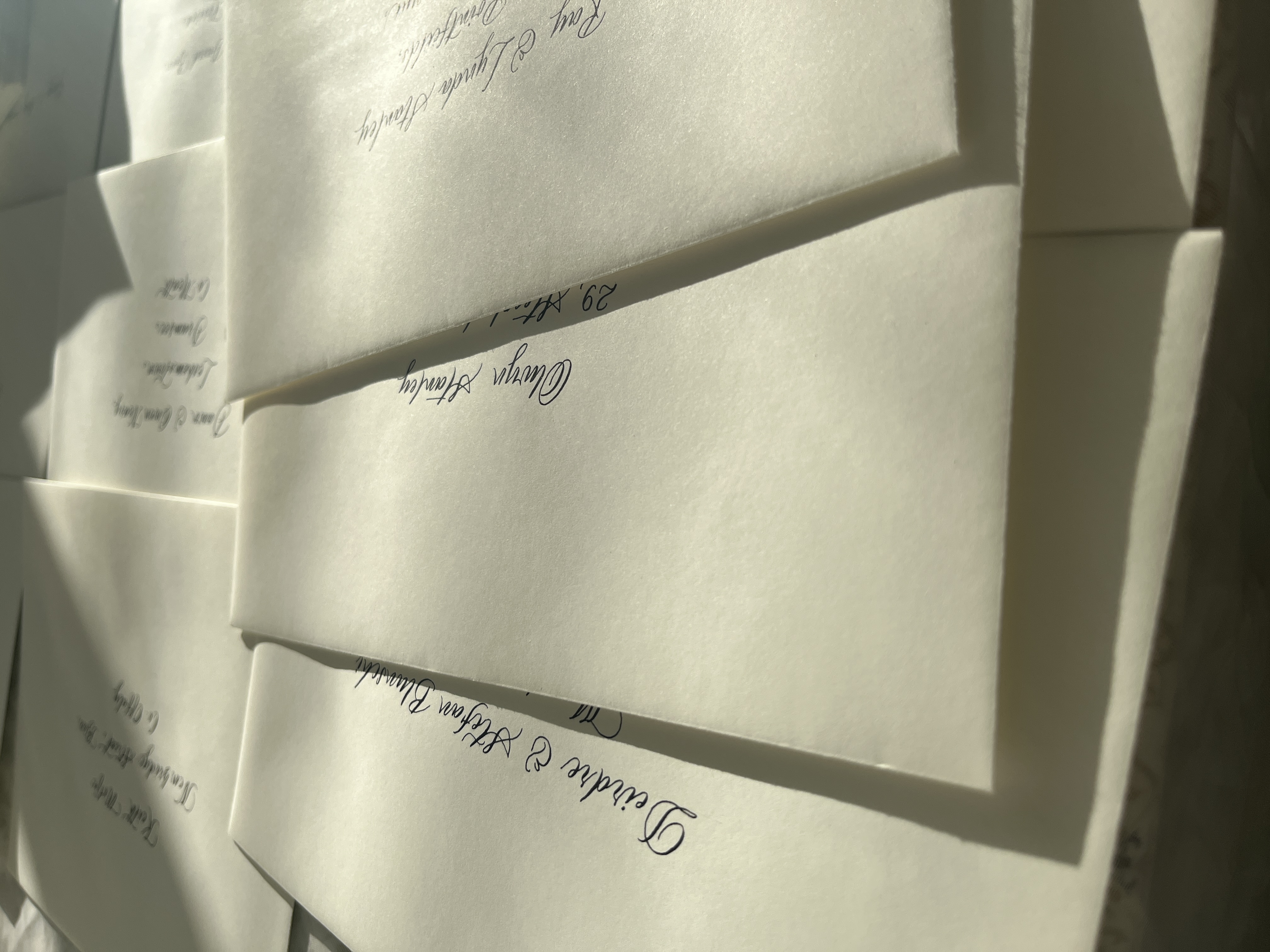 Hand-lettered wedding envelope calligraphy